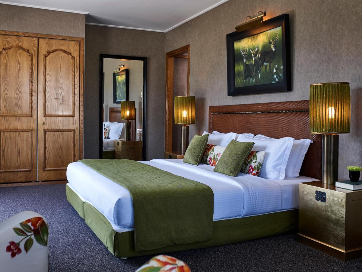 Hotel Du Lac Congress Center & Spa อิโออันนินา ภายนอก รูปภาพ A bedroom at the hotel